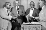 From left, Dr. Herbert L. Lang, Jackson, Miss., president of Mississippi Baptist seminary; Dr. William A. Keel, Jackson, secretary of Black work for the state Baptist Mission Board of Mississippi; Dr. Ralph W. Riley, president of American Baptist director of Black work for the home mission board of the Theological Seminary; and Dr. Guy Bellamy, Oklahoma City, Southern Baptist Convention, share a moment on the opening of the three-day South wide Conference on Black work at the American Baptist Theological Seminary on Sept. 29, 1953.