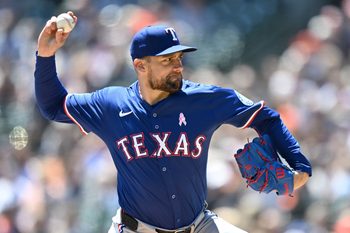 May 11, 2025; Detroit, Michigan, USA; Texas Rangers starting pitcher Nathan Eovaldi (17) throws a pitch against the Detroit Tigers in the first inning at Comerica Park. Mandatory Credit: Lon Horwedel-Imagn Images