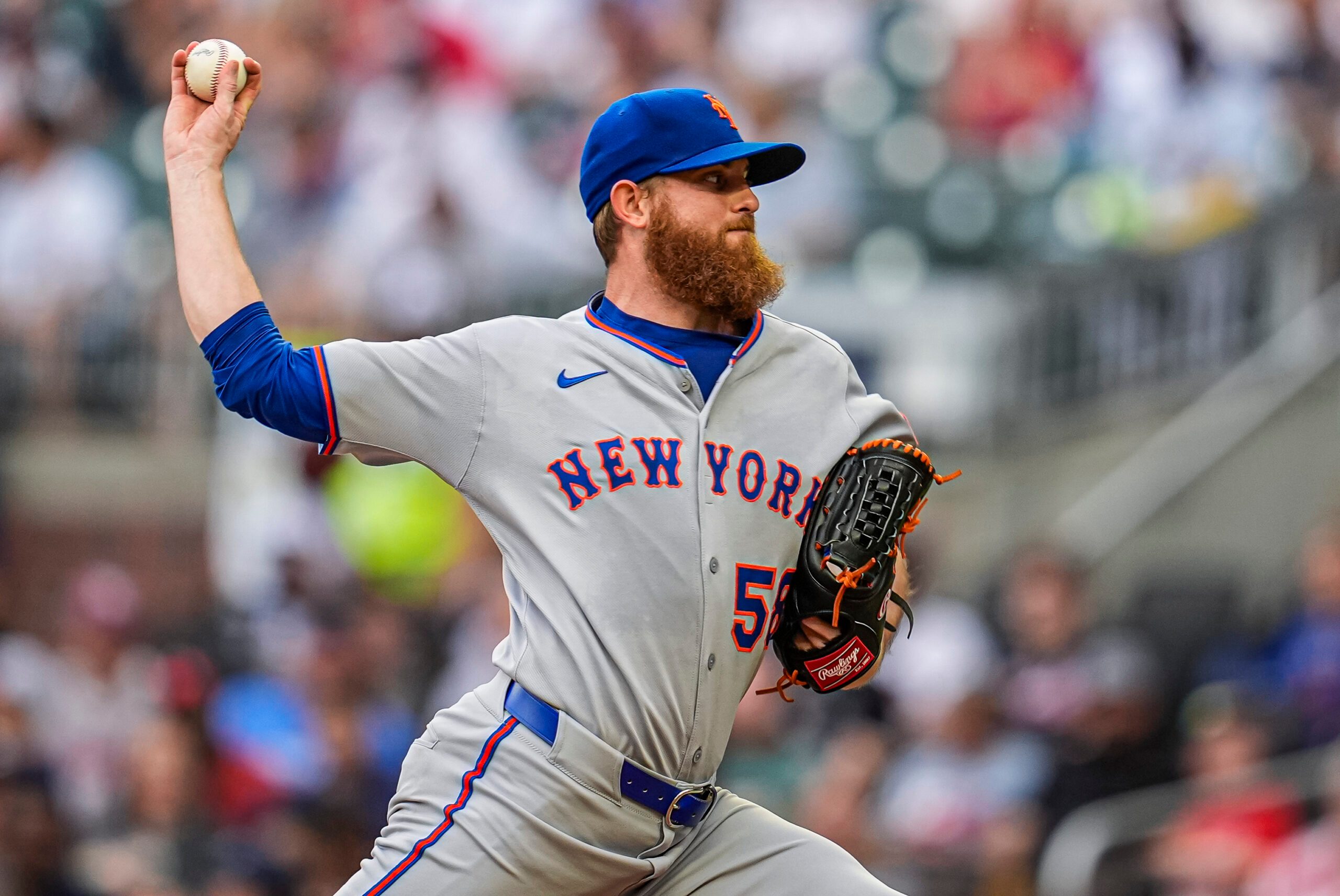 Jun 18, 2025; Cumberland, Georgia, USA; New York Mets starting pitcher Paul Blackburn (58) pitches against the Atlanta Braves during the first inning at Truist Park. Mandatory Credit: Dale Zanine-Imagn Images