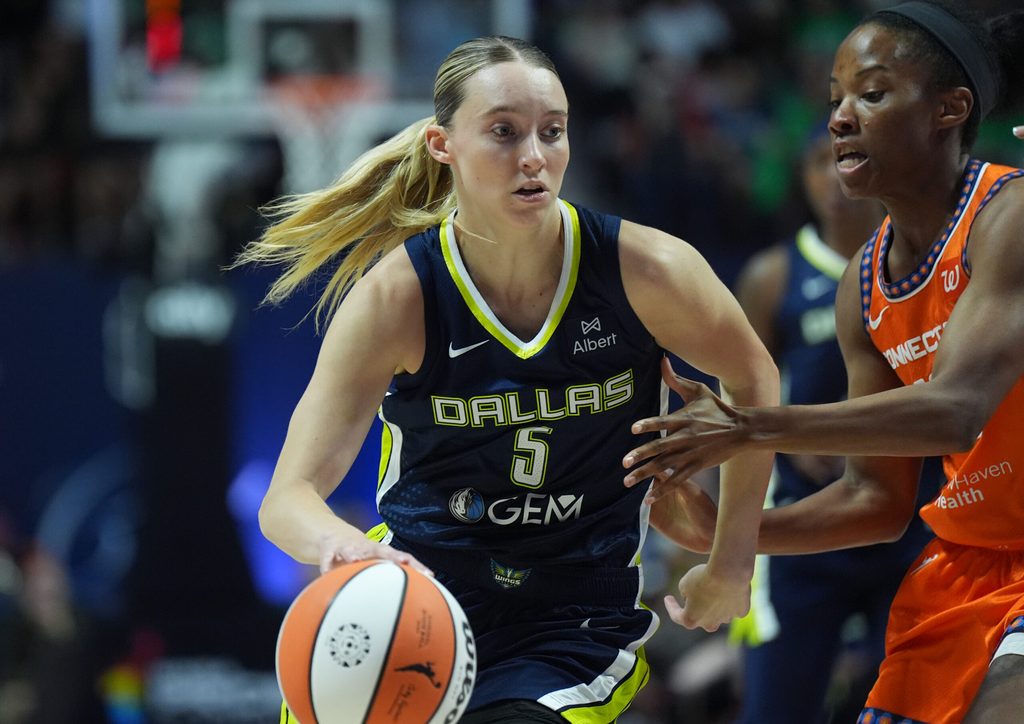 Jun 20, 2025; Uncasville, Connecticut, USA; Dallas Wings guard Paige Bueckers (5) drives the ball against Connecticut Sun guard Lindsay Allen (15) in the first half at Mohegan Sun Arena. Mandatory Credit: David Butler II-Imagn Images