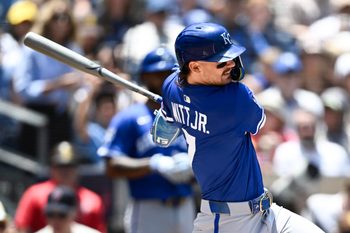 Jun 22, 2025; San Diego, California, USA; Kansas City Royals shortstop Bobby Witt Jr. (7) hits a single during the first inning against the San Diego Padres at Petco Park. Mandatory Credit: Denis Poroy-Imagn Images