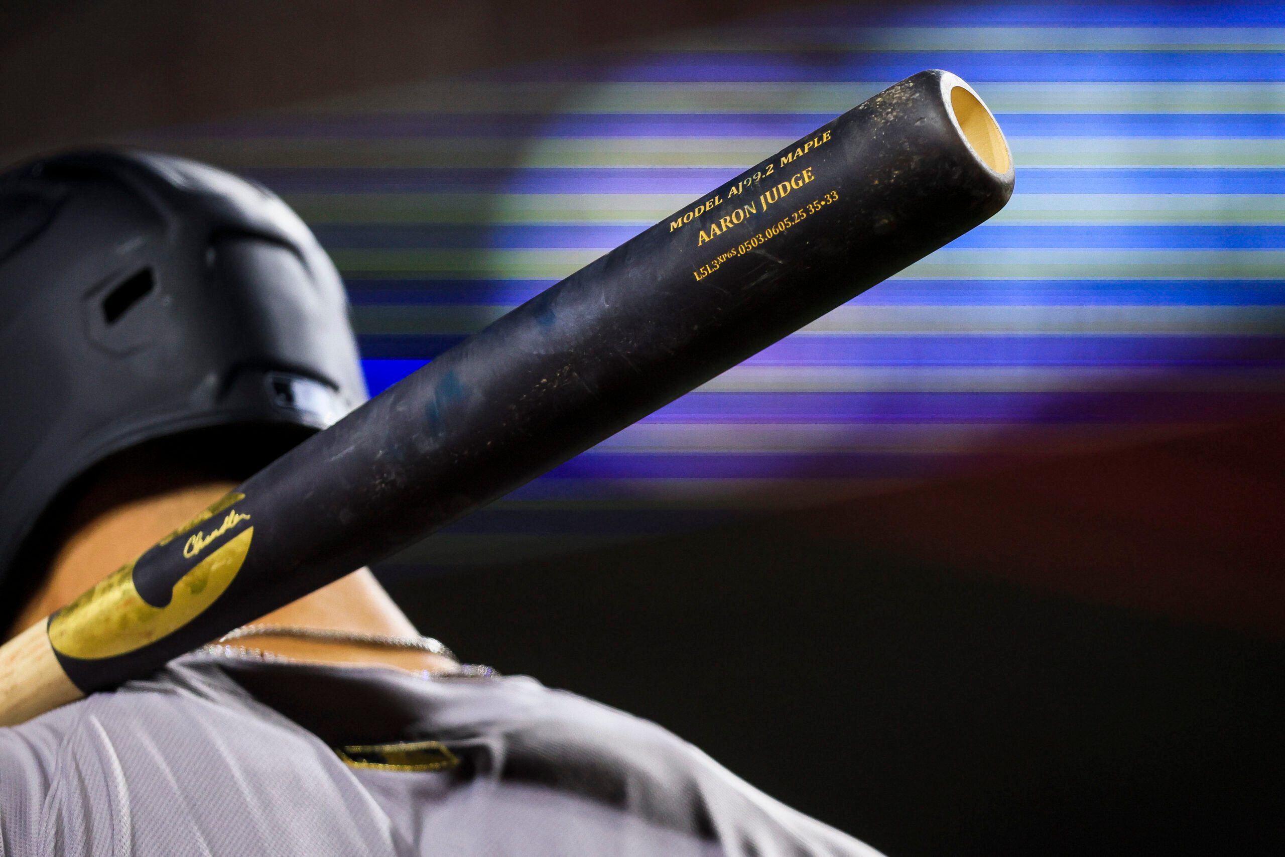 Jun 24, 2025; Cincinnati, Ohio, USA; A detail view of the bat of New York Yankees outfielder Aaron Judge (99) as he prepares on deck in the tenth inning against the Cincinnati Reds at Great American Ball Park. Mandatory Credit: Katie Stratman-Imagn Images