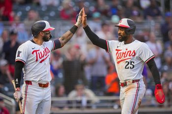 Jun 25, 2025; Minneapolis, Minnesota, USA; Minnesota Twins outfielder Byron Buxton (25) celebrates his run with shortstop Carlos Correa (4) against the Seattle Mariners in the sixth inning at Target Field. Mandatory Credit: Brad Rempel-Imagn Images