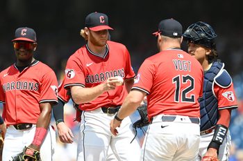 Jun 26, 2025; Cleveland, Ohio, USA; Cleveland Guardians manager Stephen Vogt (12) relieves pitcher Zak Kent (61) during the ninth inning against the Toronto Blue Jays at Progressive Field. Mandatory Credit: Ken Blaze-Imagn Images