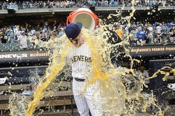 Jun 28, 2025; Milwaukee, Wisconsin, USA;  Milwaukee Brewers shortstop Joey Ortiz (3) gets the post game dunk after the Brewers defeated the Colorado Rockies at American Family Field. Mandatory Credit: Benny Sieu-Imagn Images
