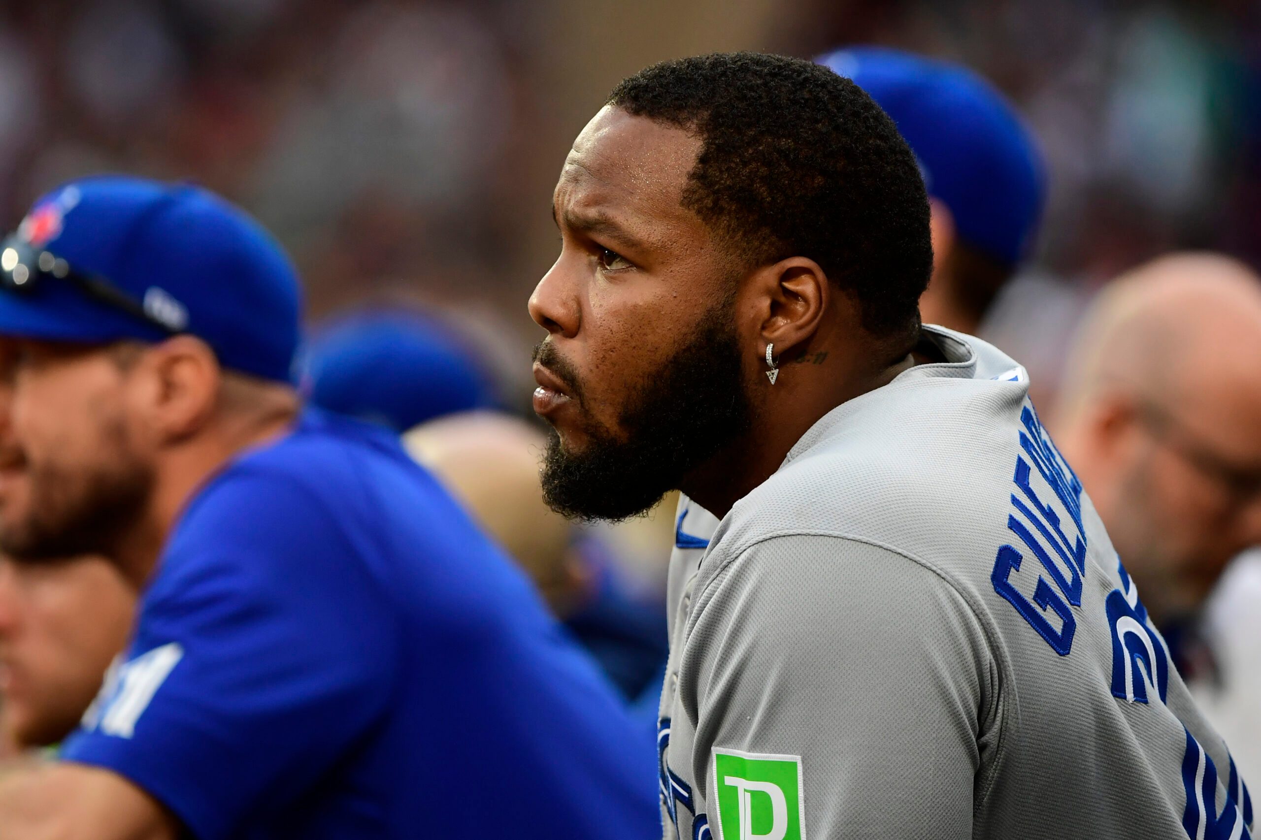 Jun 28, 2025; Boston, Massachusetts, USA; Toronto Blue Jays designated hitter Vladimir Guerrero Jr. (27) watches from the dugout during the ninth inning against the Boston Red Sox at Fenway Park. Mandatory Credit: Bob DeChiara-Imagn Images