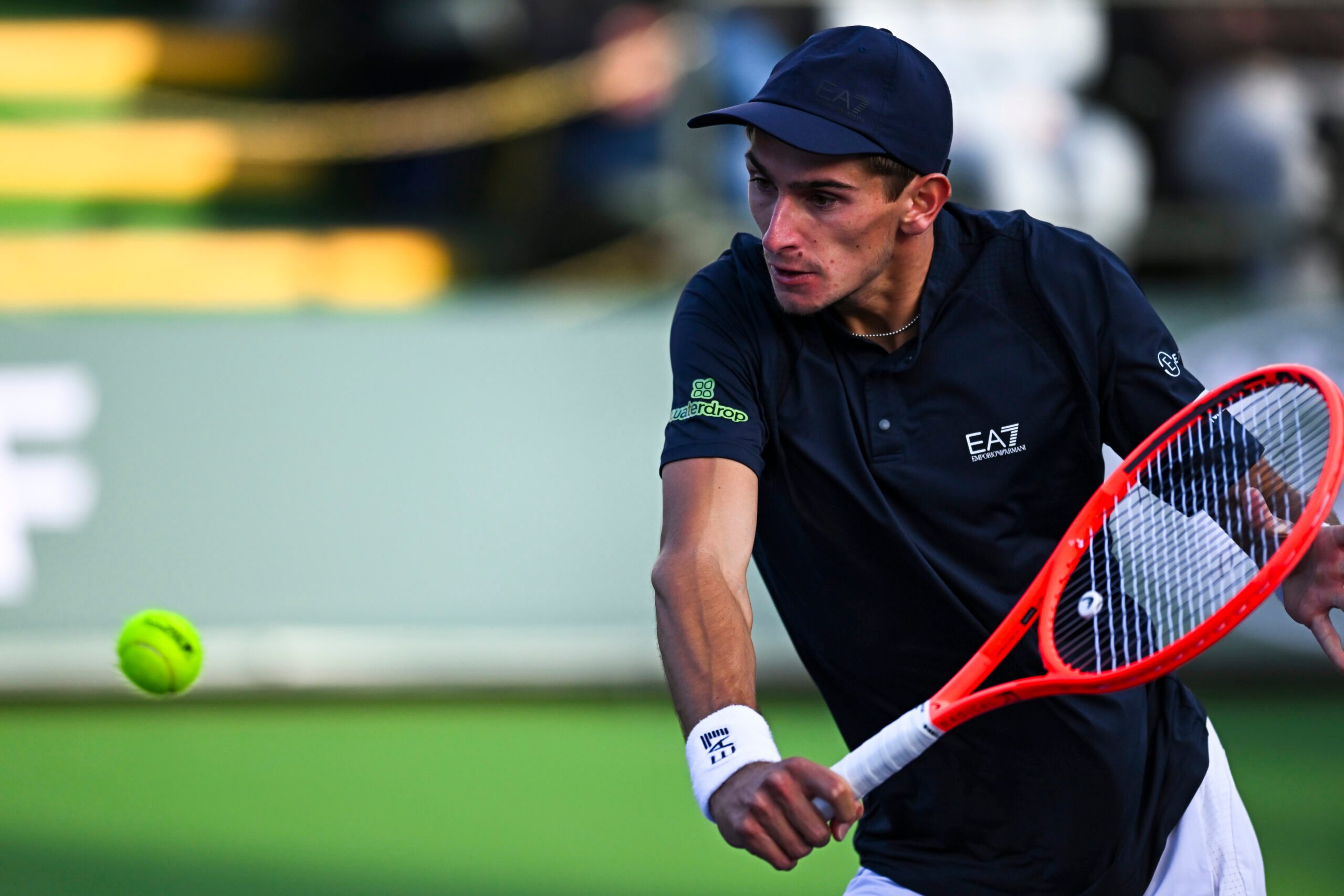 Mar 6, 2025; Indian Wells, CA, USA; Matteo Arnaldi (ITA) hits a ball against Aleksander Kovacevic (USA) in the BNP Paribas Open at the Indian Well Tennis Garden. Mandatory Credit: Jonathan Hui-Imagn Images