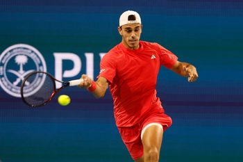 Mar 26, 2025; Miami, FL, USA; Francisco Cerundolo (ARG) hits a forehand against Grigor Dimitrov (BUL)(not pictured) on day nine of the Miami Open at Hard Rock Stadium. Mandatory Credit: Geoff Burke-Imagn Images