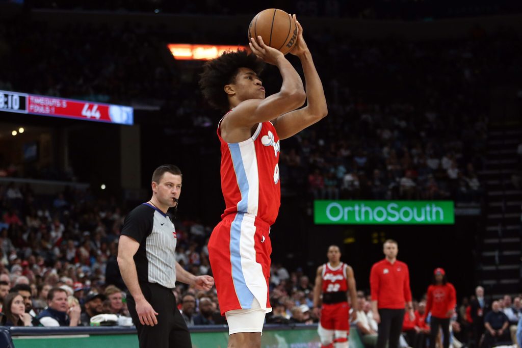 Apr 1, 2025; Memphis, Tennessee, USA; Memphis Grizzlies forward Jaylen Wells (0) shoots for three during the second quarter against the Golden State Warriors at FedExForum. Mandatory Credit: Petre Thomas-Imagn Images