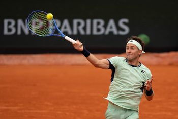 May 28, 2025; Paris, FR; Casper Ruud of Norway returns a shot during his match against Nuno Borges of Portugal on day four at Roland Garros Stadium.  Mandatory Credit: Susan Mullane-Imagn Images