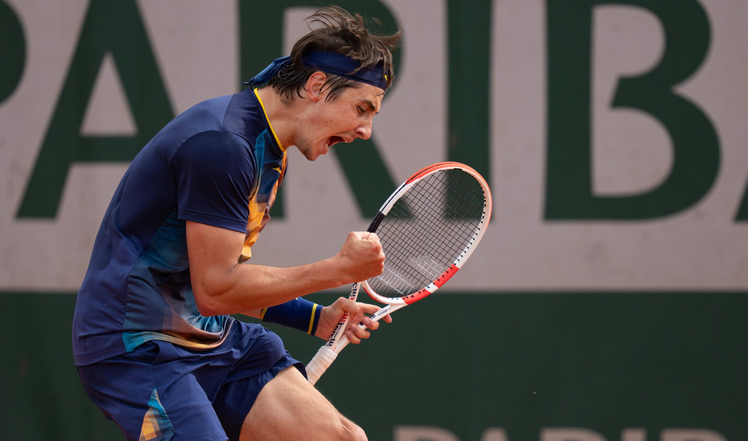 May 29, 2025; Paris, FR; Alexander Shevchenko of Kazakhstan reacts to a point during his match against Ethan Quinn of the United States on day five at Roland Garros Stadium.  Mandatory Credit: Susan Mullane-Imagn Images
