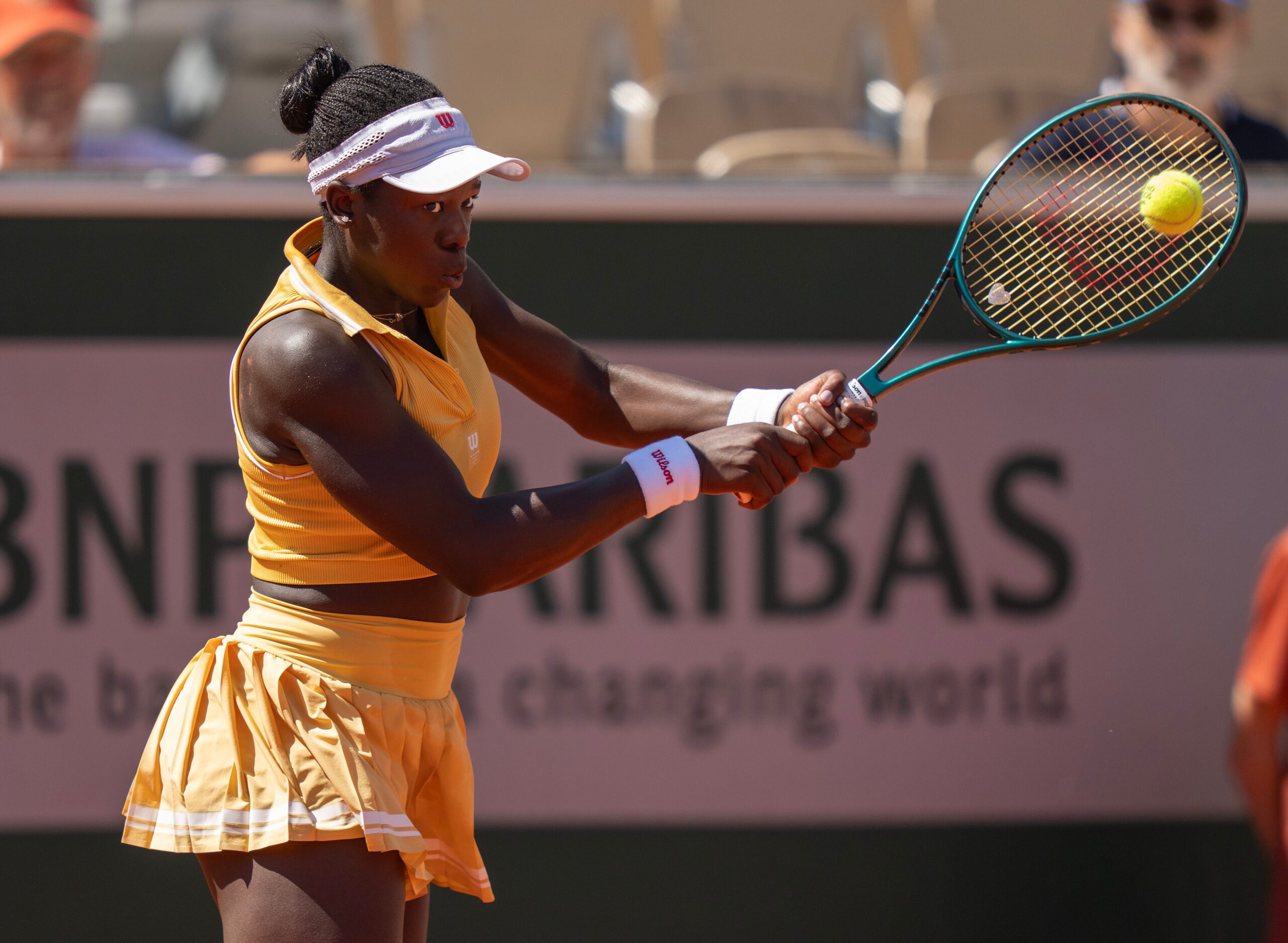 May 30, 2025; Paris, FR; Victoria Mboko of Canada returns a shot during her match against Qinwen Zheng  of China on day six at Roland Garros Stadium.  Mandatory Credit: Susan Mullane-Imagn Images