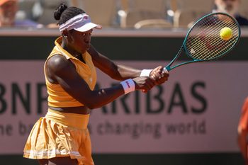 May 30, 2025; Paris, FR; Victoria Mboko of Canada returns a shot during her match against Qinwen Zheng  of China on day six at Roland Garros Stadium.  Mandatory Credit: Susan Mullane-Imagn Images
