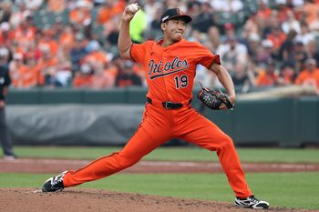 Jun 14, 2025; Baltimore, Maryland, USA; Baltimore Orioles pitcher Tomoyuki Sugano (19) throws during the third inning against the Los Angeles Angels at Oriole Park at Camden Yards. Mandatory Credit: Daniel Kucin Jr.-Imagn Images