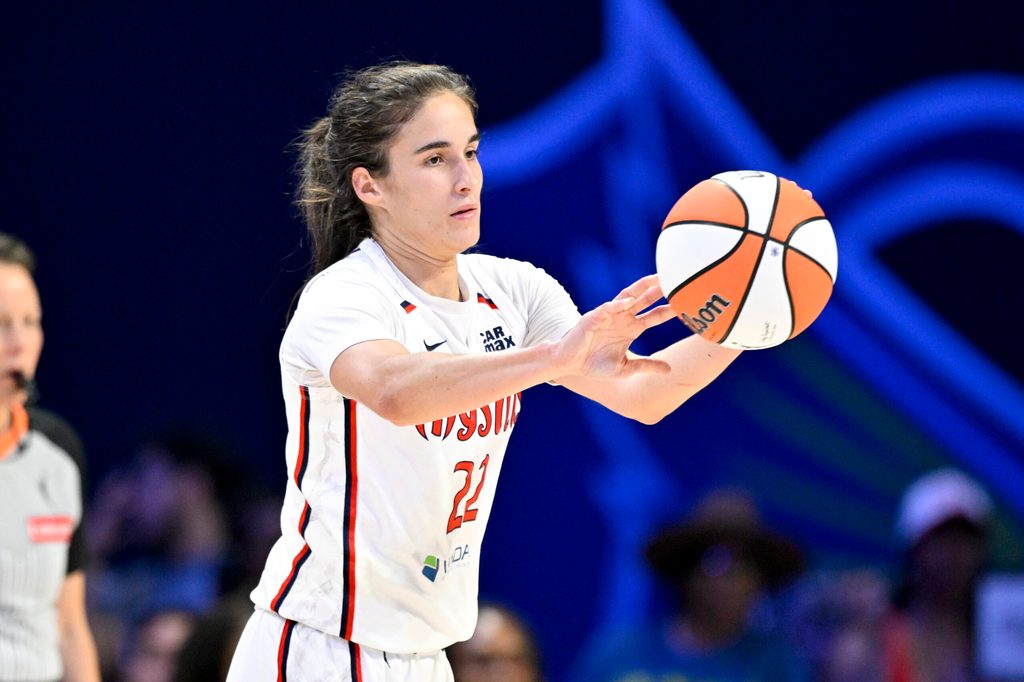 Jun 28, 2025; Arlington, Texas, USA; Washington Mystics guard Sonia Citron (22) passes the ball against the Dallas Wings during the second half at College Park Center. Mandatory Credit: Jerome Miron-Imagn Images