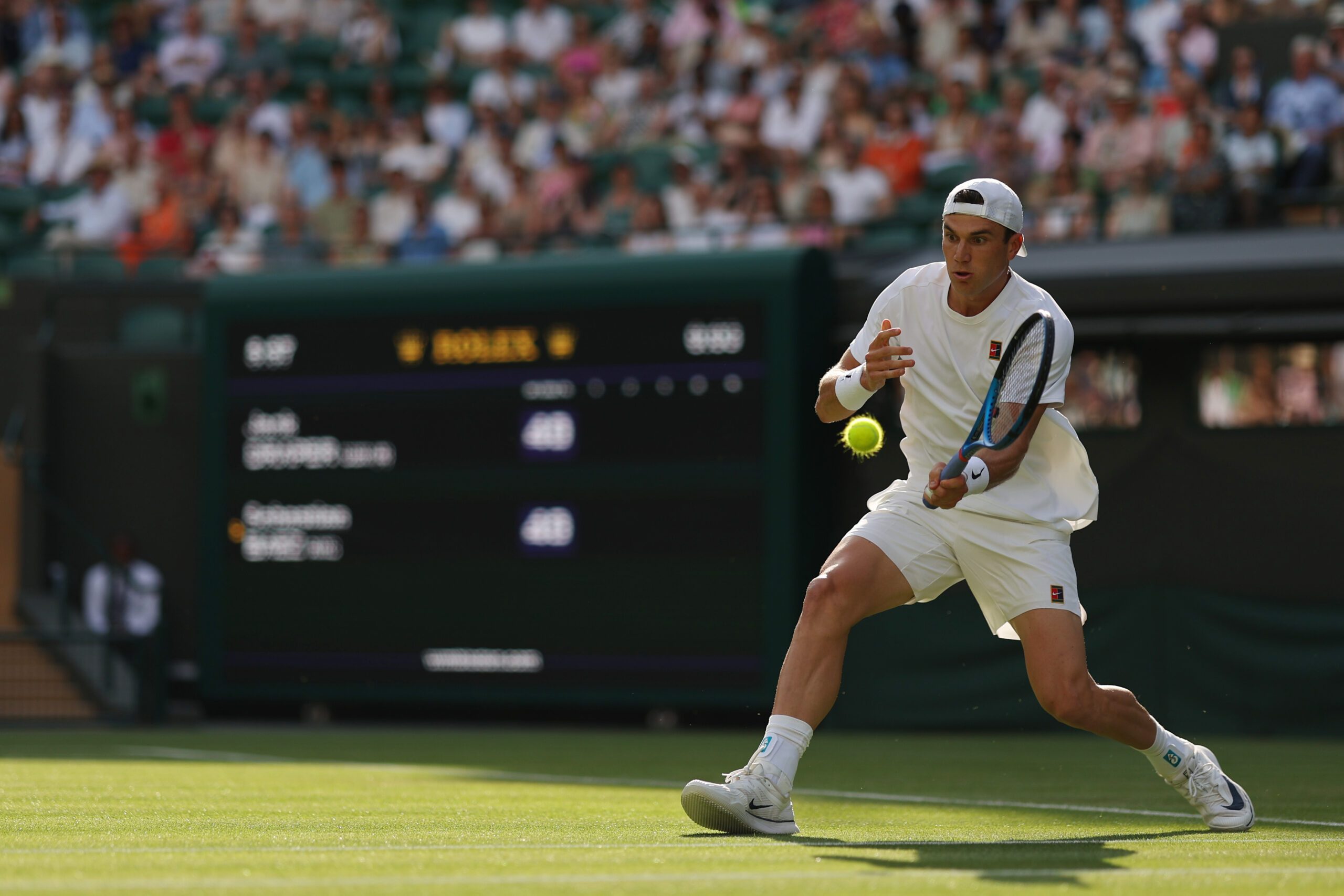 Jul 1, 2025; Wimbledon United Kingdom; Jack Draper (GBR) hits a forehand against Sebastian Báez (ARG)(not pictured) on day 2 of The Championships, Wimbledon 2025 at All England Lawn Tennis and Croquet Club. Mandatory Credit: Geoff Burke-Imagn Images
