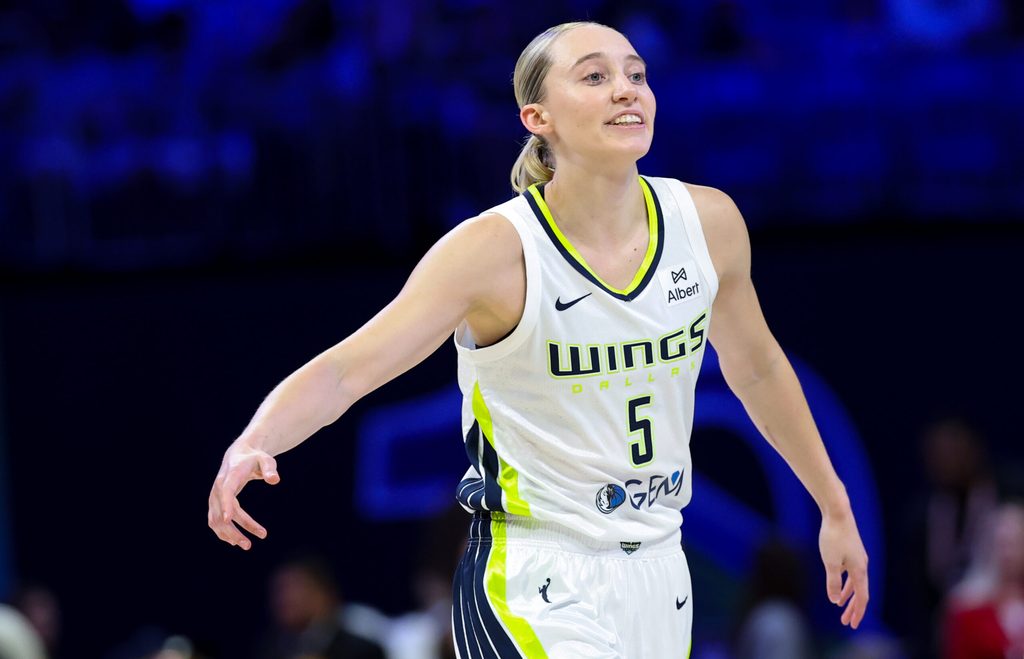 Jul 3, 2025; Arlington, Texas, USA; Dallas Wings guard Paige Bueckers (5) reacts against the Phoenix Mercury during the first half at College Park Center. Mandatory Credit: Kevin Jairaj-Imagn Images