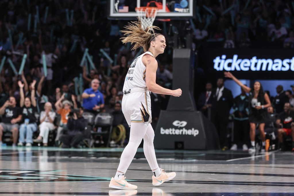 Jul 3, 2025; Brooklyn, New York, USA; New York Liberty guard Sabrina Ionescu (20) celebrates after scoring in the third quarter against the Los Angeles Sparks at Barclays Center. Mandatory Credit: Wendell Cruz-Imagn Images