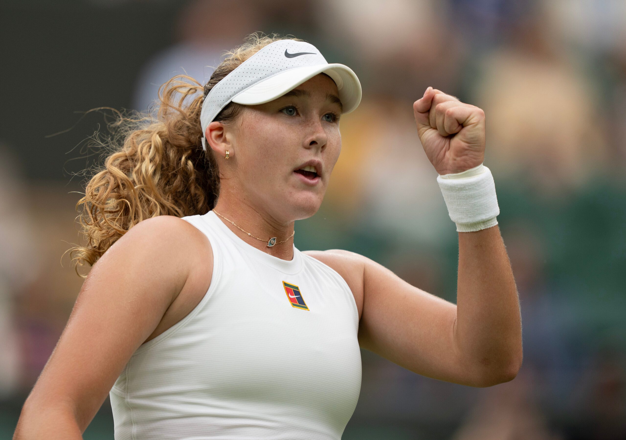 Jul 5, 2025; Wimbledon, United Kingdom;  Mirra Andreeva reacts to a point during her match against Hailey Baptiste of the United States on day six at the All England Lawn Tennis and Croquet Club. Mandatory Credit: Susan Mullane-Imagn Images