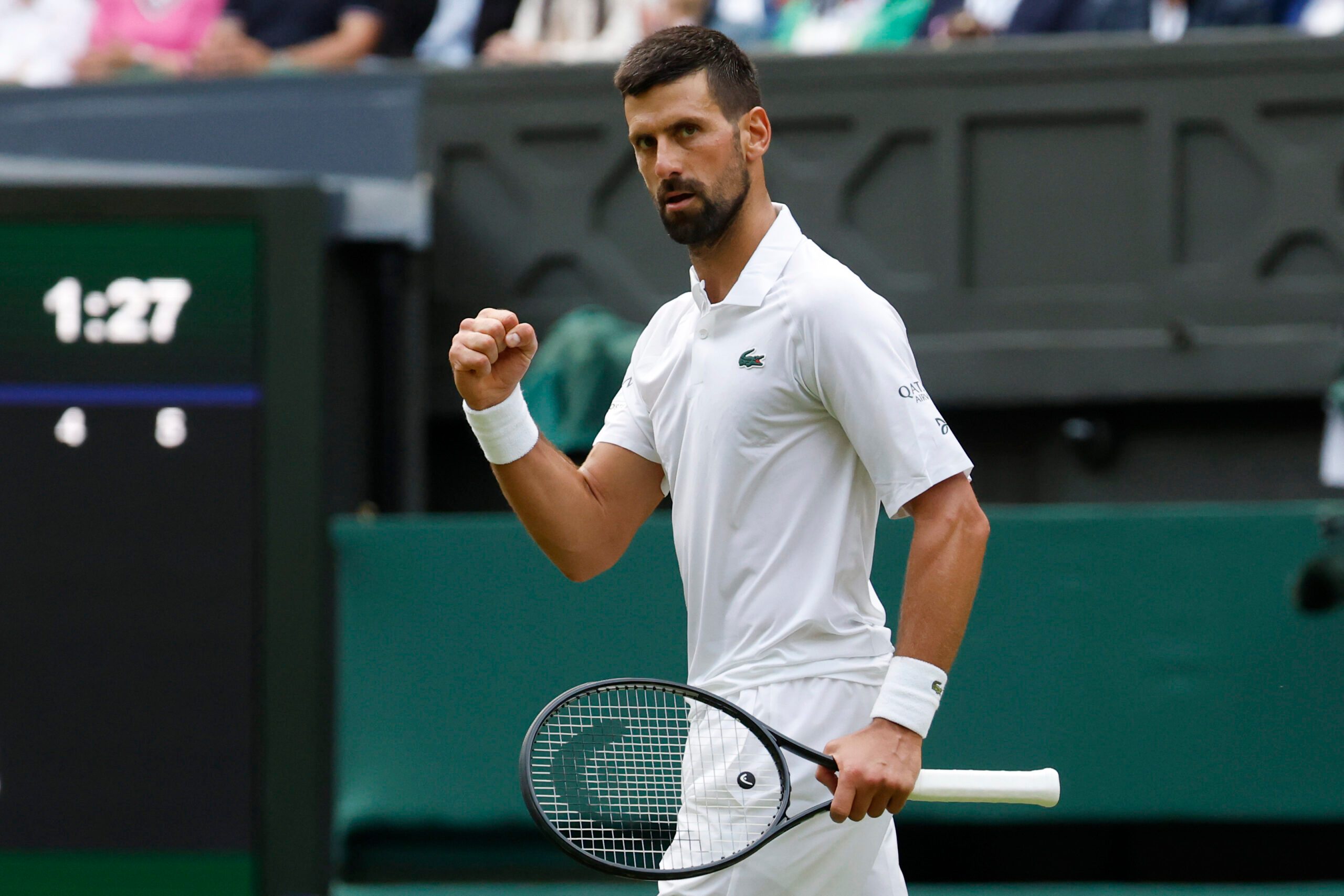Jul 5, 2025; Wimbledon, United Kingdom; Novak Djokovic (SRB) reacts after winning a game against Miomir Kecmanovic (SRB)(not pictured) on day six of The Championships Wimbledon 2025 at All England Lawn Tennis and Croquet Club. Mandatory Credit: Geoff Burke-Imagn Images