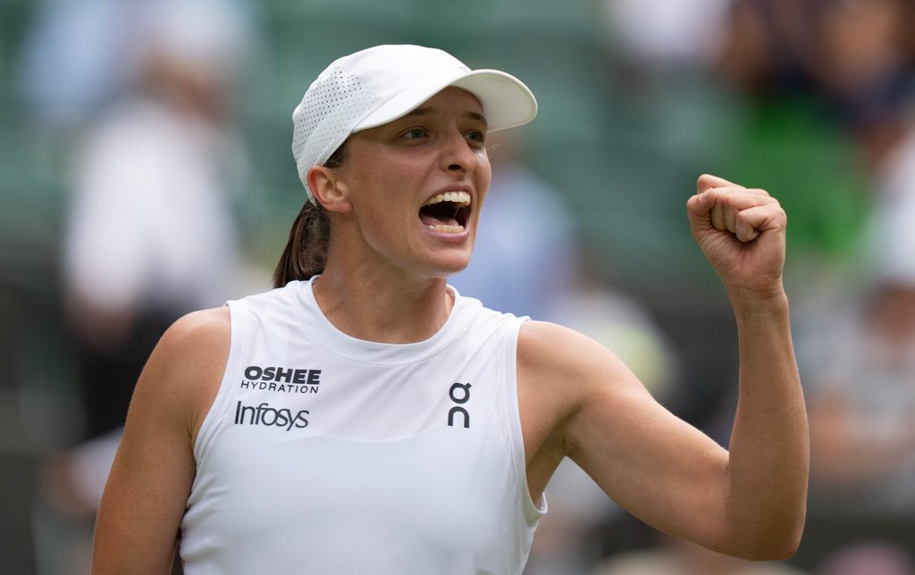 Jul 9, 2025; Wimbledon, United Kingdom; Iga Swiatek of Poland celebrates winning her match against Liudmila Samsonova on day 10 at All England Lawn Tennis and Croquet Club. Mandatory Credit: Susan Mullane-Imagn Images