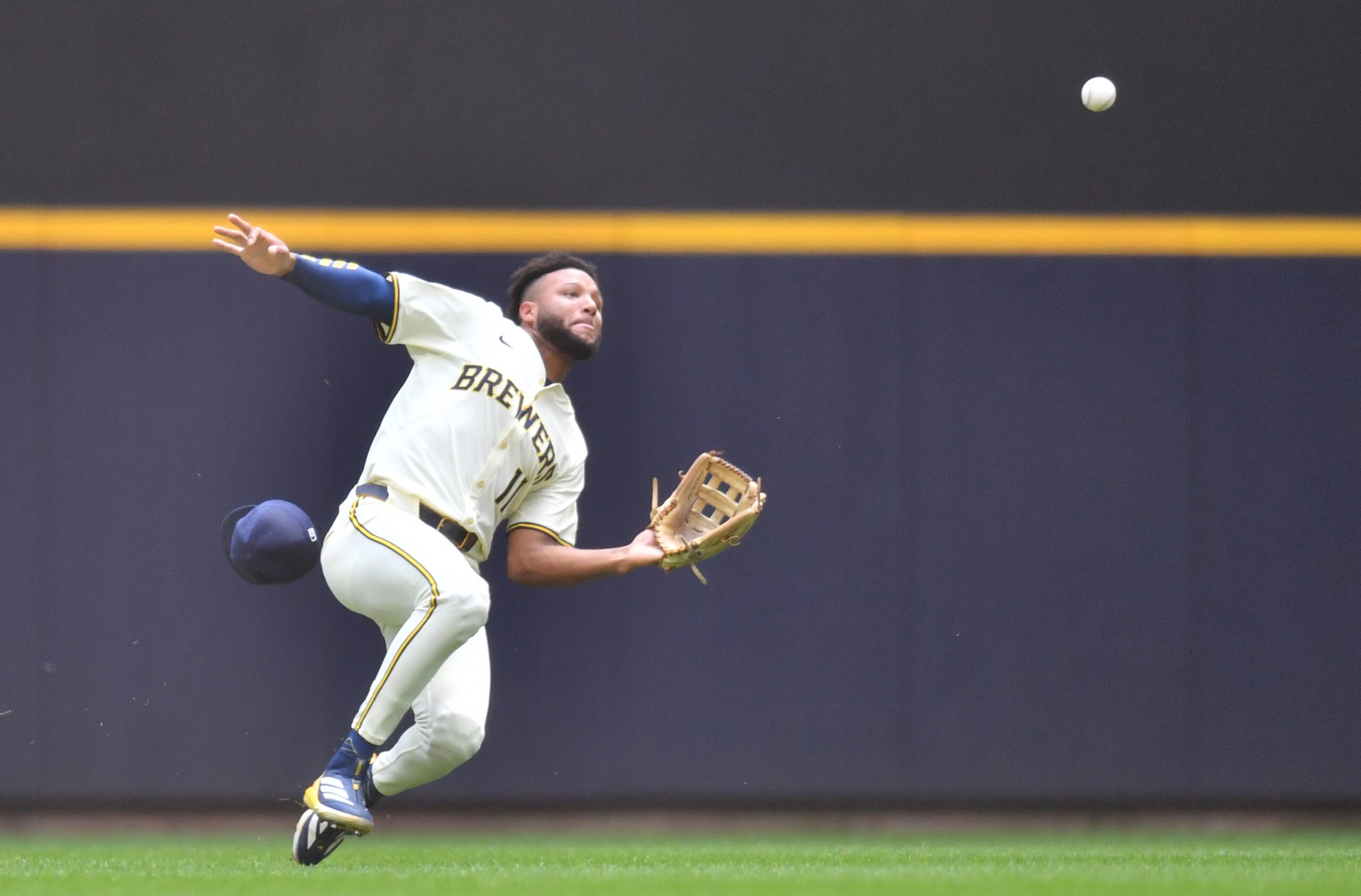 Jul 9, 2025; Milwaukee, Wisconsin, USA; Milwaukee Brewers center fielder Jackson Chourio (11) catches Los Angeles Dodgers designated hitter Shohei Ohtaniís (not pictured) fly ball during the third inning at American Family Field. Mandatory Credit: Patrick Gorski-Imagn Images