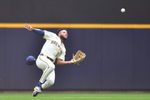 Jul 9, 2025; Milwaukee, Wisconsin, USA; Milwaukee Brewers center fielder Jackson Chourio (11) catches Los Angeles Dodgers designated hitter Shohei Ohtaniís (not pictured) fly ball during the third inning at American Family Field. Mandatory Credit: Patrick Gorski-Imagn Images