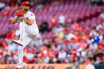 Jul 8, 2025; Cincinnati, Ohio, USA; Cincinnati Reds starting pitcher Nick Martinez (28) pitches against the Miami Marlins in the first inning at Great American Ball Park. Mandatory Credit: Katie Stratman-Imagn Images