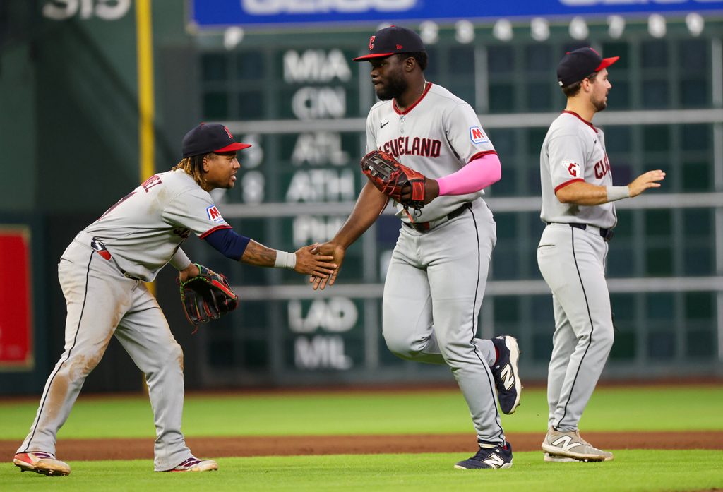 Jul 9, 2025; Houston, Texas, USA; Cleveland Guardians third baseman Jose Ramirez (11) celebrates with  right fielder Jhonkensy Noel (43) after defeating the Houston Astros  at Daikin Park. Mandatory Credit: Thomas Shea-Imagn Images