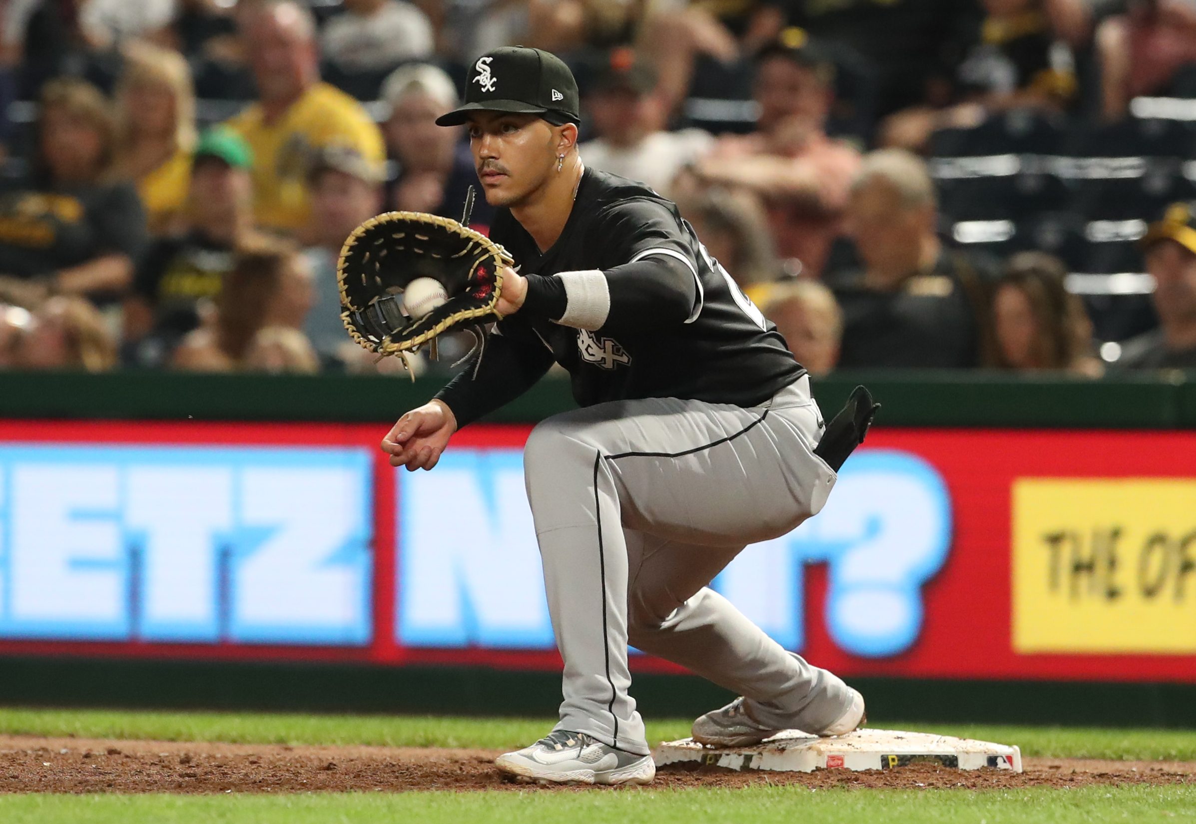 Jul 18, 2025; Pittsburgh, Pennsylvania, USA;  Chicago White Sox third baseman Miguel Vargas (20) takes a throw to retire Pittsburgh Pirates shortstop Liover Peguero (not pictured) during the eighth inning at PNC Park. Mandatory Credit: Charles LeClaire-Imagn Images