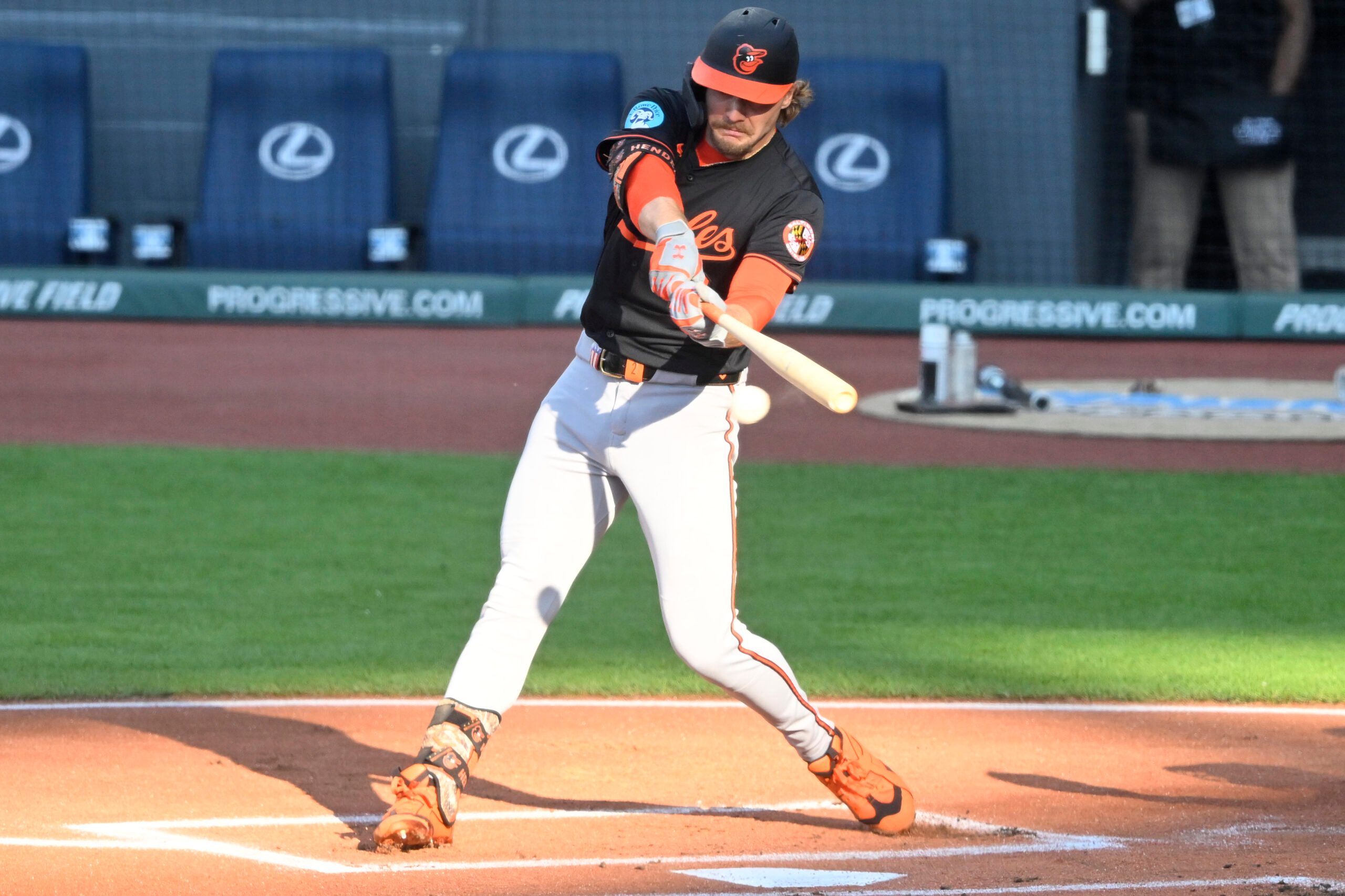 Jul 21, 2025; Cleveland, Ohio, USA; Baltimore Orioles shortstop Gunnar Henderson (2) hits an RBI single in the first inning against the Cleveland Guardians at Progressive Field. Mandatory Credit: David Richard-Imagn Images