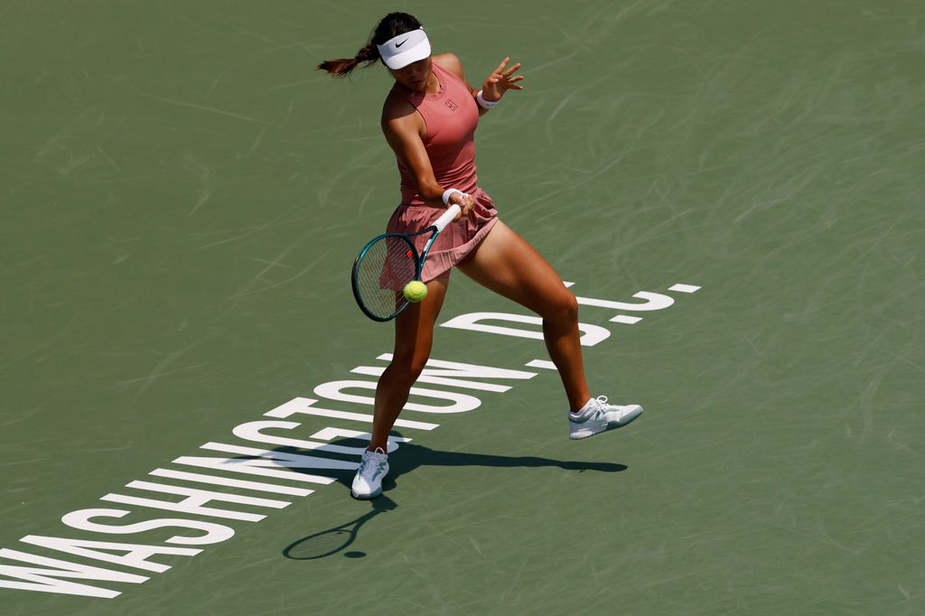 Jul 25, 2025; Washington, D.C., USA; Emma Raducanu (GBR) hits a forehand against Maria Sakkari (GRE)(not pictured) in a women's singles quarter-final of the Mubadala Citi DC Open at Rock Creek Park Tennis Center. Mandatory Credit: Geoff Burke-Imagn Images