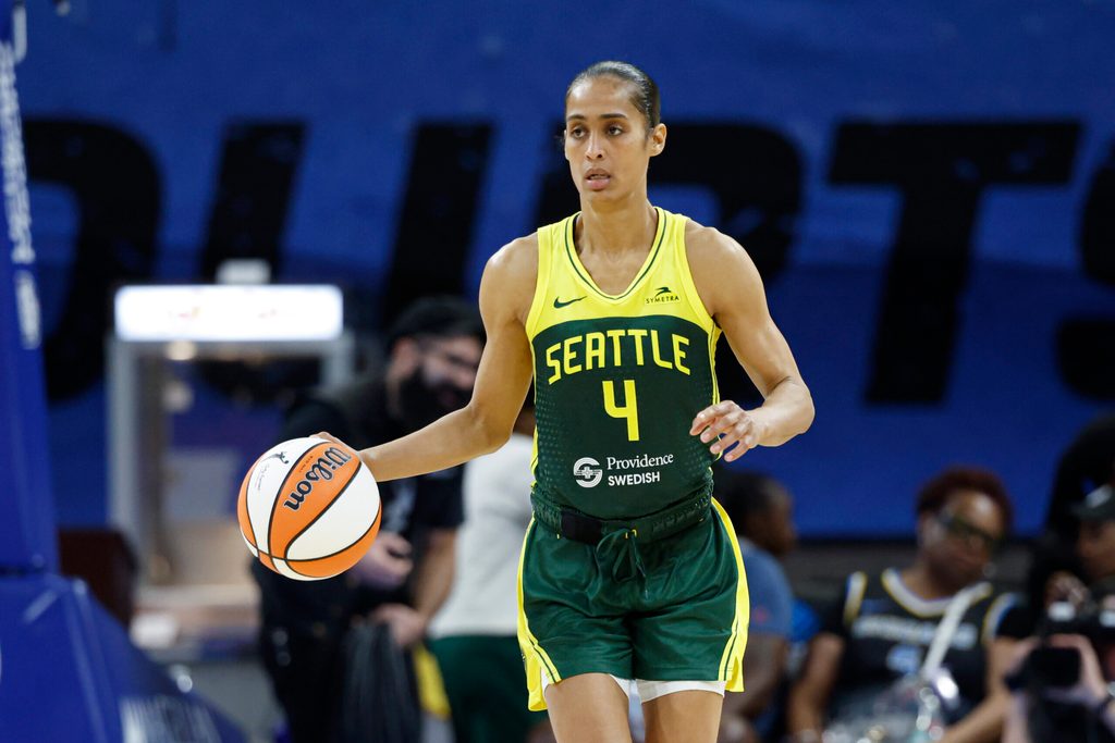 Jul 24, 2025; Chicago, Illinois, USA; Seattle Storm guard Skylar Diggins (4) brings the ball up court against the Chicago Sky during the second half at Wintrust Arena. Mandatory Credit: Kamil Krzaczynski-Imagn Images
