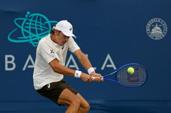Jul 25, 2025; Washington, D.C., USA; Alex de Minaur (AUS) hits a backhand against Brandon Nakashima (USA)(not pictured) in a men's singles quarter final of the Mubadala Citi DC Open at Rock Creek Park Tennis Center. Mandatory Credit: Geoff Burke-Imagn Images