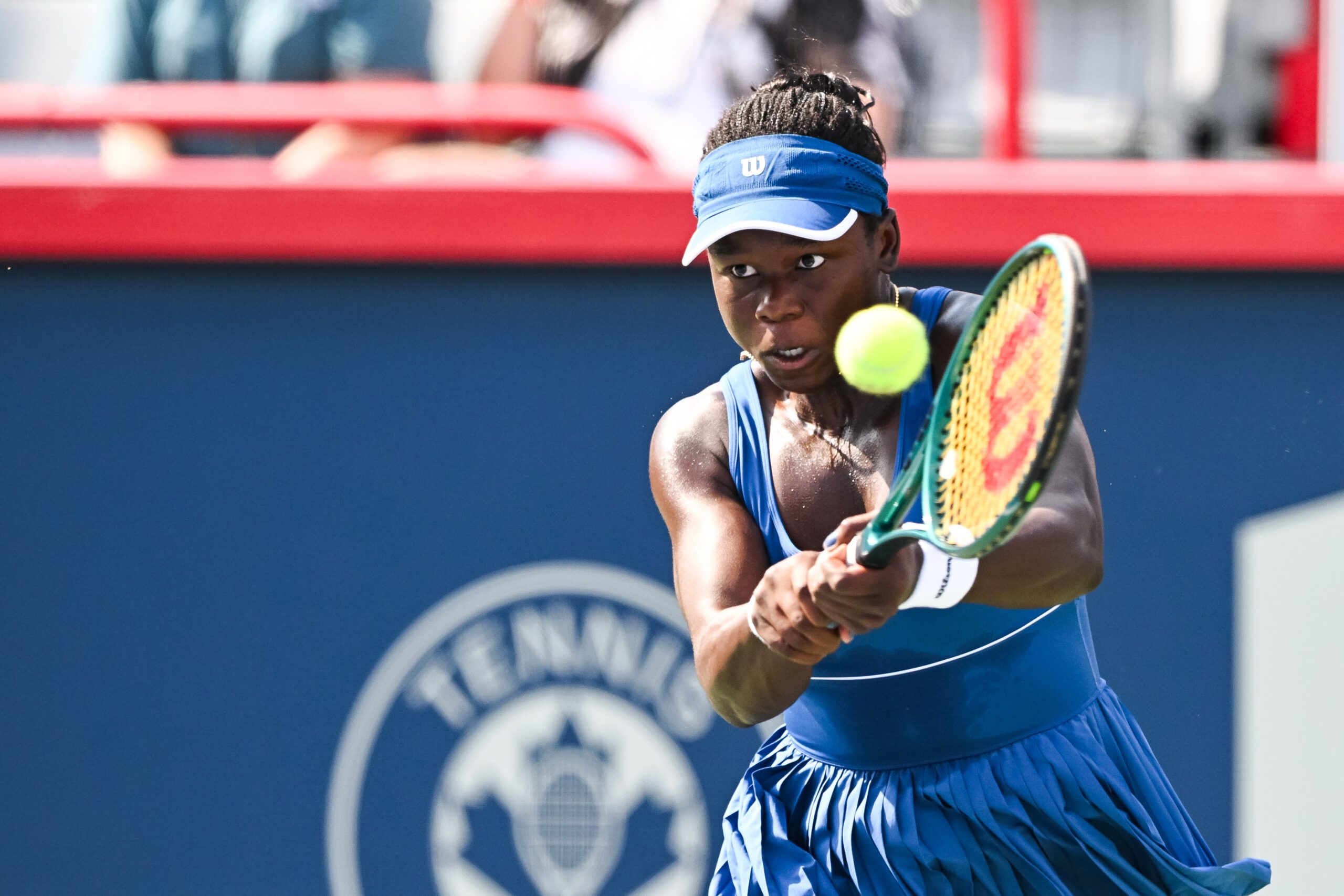 Jul 27, 2025; Montreal, QC, Canada; Victoria Mboko (CAN) returns the ball to Kimberly Birrell (AUS) (Not Pictured) in first round play at IGA Stadium. Mandatory Credit: David Kirouac-Imagn Images