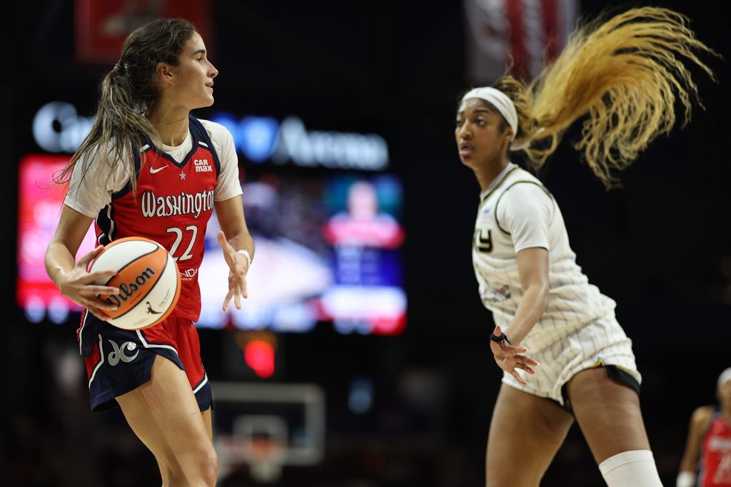Jul 29, 2025; Washington, District of Columbia, USA; Washington Mystics guard Sonia Citron (22) dribbles the ball as Chicago Sky forward Angel Reese (5) defends in the second half at CareFirst Arena. Mandatory Credit: Geoff Burke-Imagn Images