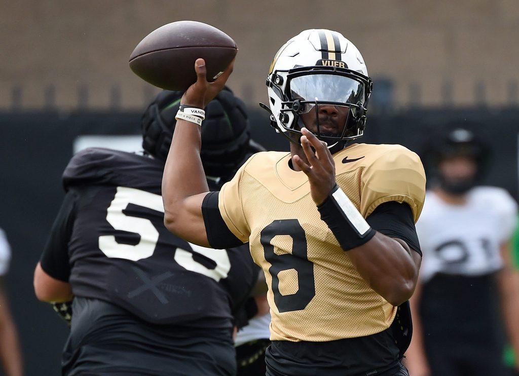 Vanderbilt quarterback Nate Johnson (8) passes during an NCAA college football practice Friday, Aug. 2, 2024, in Nashville, Tenn.