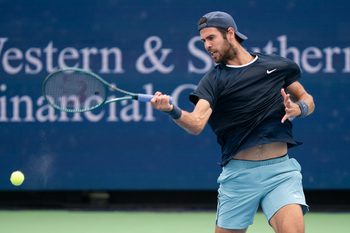 Aug 15, 2024; Cincinnati, OH, USA ; Karen Khachanov returns a shot against  Alexander Zverev of Germany on day four of the Cincinnati Open. Mandatory Credit: Susan Mullane-Imagn Images