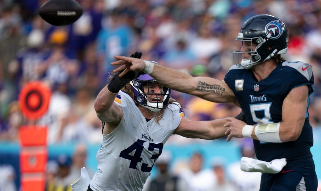 Minnesota Vikings linebacker Andrew Van Ginkel (43) pressures Tennessee Titans quarterback Will Levis (8) on a throw in the second half at Nissan Stadium in Nashville, Tenn., Sunday, Nov. 17, 2024.