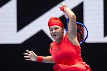 Jan 17, 2025; Melbourne, Victoria, Australia; Diana Shnaider hits a forehand during her match against Donna Vekic of Croatia in the third round of the women's singles at the 2025 Australian Open at Melbourne Park. Mandatory Credit: Mike Frey-Imagn Images