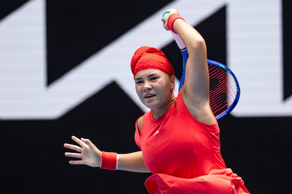 Jan 17, 2025; Melbourne, Victoria, Australia; Diana Shnaider hits a forehand during her match against Donna Vekic of Croatia in the third round of the women's singles at the 2025 Australian Open at Melbourne Park. Mandatory Credit: Mike Frey-Imagn Images