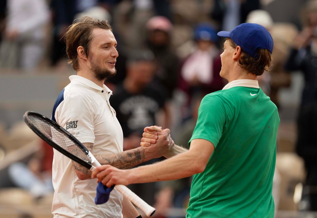 Jun 4, 2025; Paris, FR; Jannik Sinner of Italy at the net with Alexander Bublik of Kazakhstan after their match on day 11 at Roland Garros Stadium. Mandatory Credit: Susan Mullane-Imagn Images