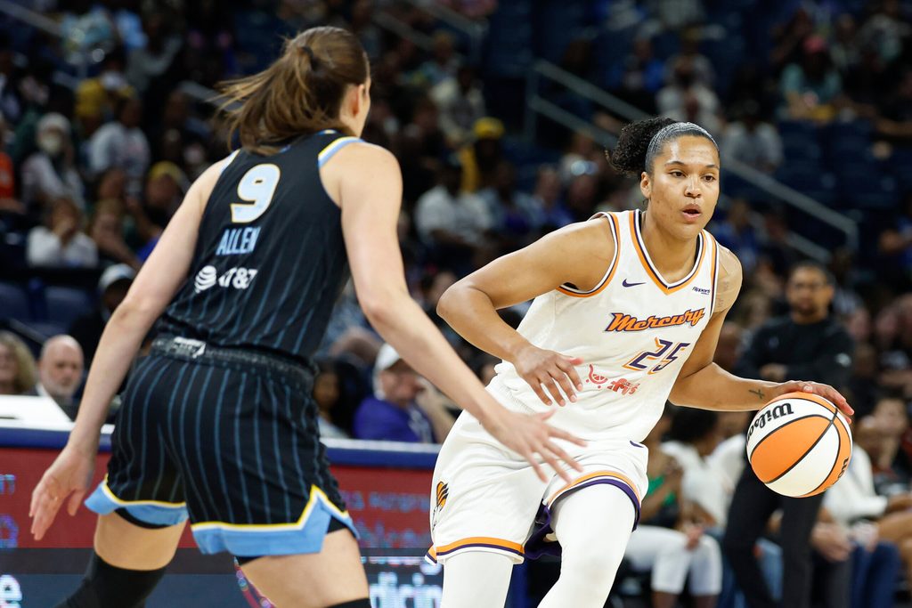 Aug 3, 2025; Chicago, Illinois, USA; Phoenix Mercury forward Alyssa Thomas (25) brings the ball up court against Chicago Sky guard Rebecca Allen (9) during the first half at Wintrust Arena. Mandatory Credit: Kamil Krzaczynski-Imagn Images