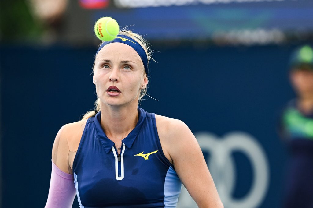 Jul 30, 2025; Montreal, QC, Canada; Rebecca Sramkova (SVK) looks at a ball against Caty Mcnally (USA) in second round play at IGA Stadium. Mandatory Credit: David Kirouac-Imagn Images