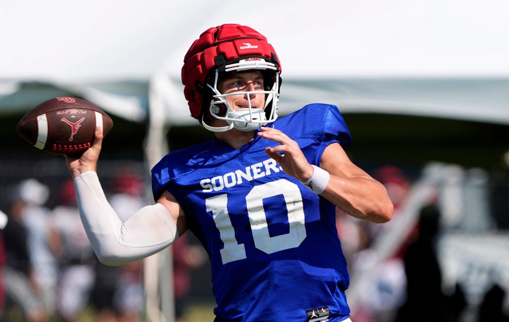 Oklahoma's John Mateer throws a pass during football practice for the University of Oklahoma Sooners in Norman, Okla., Wednesday, Aug., 6, 2025.