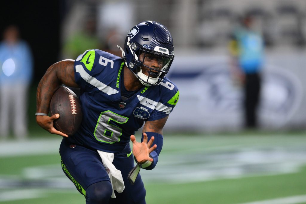 Aug 7, 2025; Seattle, Washington, USA; Seattle Seahawks quarterback Jalen Milroe (6) carries the ball against the Las Vegas Raiders during the second half at Lumen Field. Mandatory Credit: Steven Bisig-Imagn Images