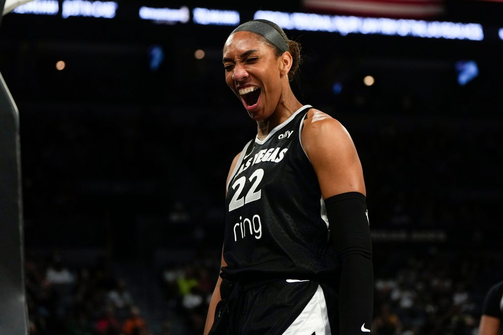 Aug 8, 2025; Las Vegas, Nevada, USA; Las Vegas Aces center A'ja Wilson (22) reacts after scoring against the Seattle Storm during the first half of a WNBA basketball game at Michelob Ultra Arena. Mandatory Credit: Lucas Peltier-Imagn Images