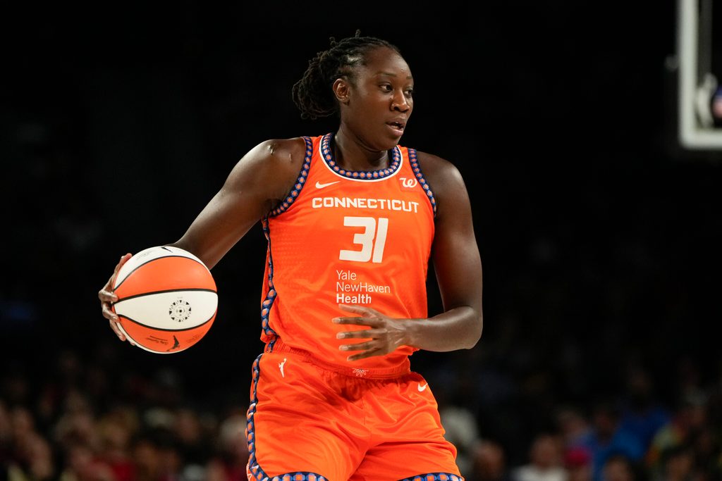 Aug 10, 2025; Las Vegas, Nevada, USA; Connecticut Sun center Tina Charles (31) dribbles the ball against the Las Vegas Aces during the first half of a WNBA basketball game at Michelob Ultra Arena. Mandatory Credit: Lucas Peltier-Imagn Images