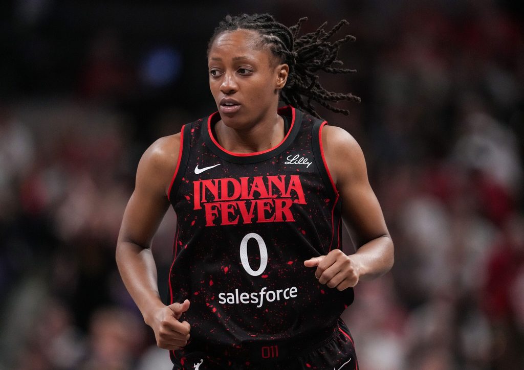 Indiana Fever guard Kelsey Mitchell (0) rushes up the court Tuesday, Aug. 12, 2025, during the game at Gainbridge Fieldhouse in Indianapolis. The Dallas Wings defeated the Indiana Fever, 81-80.