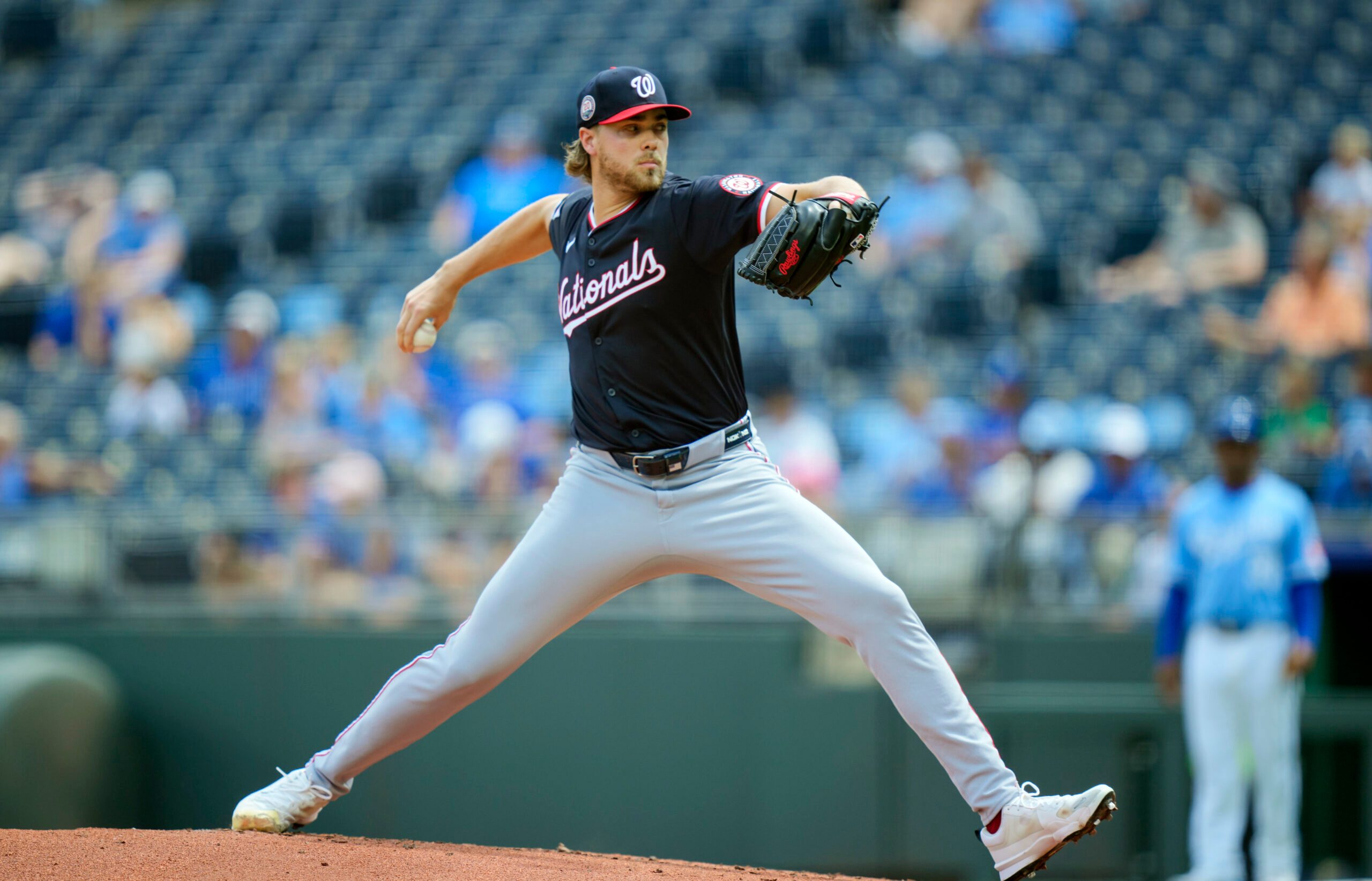 Aug 13, 2025; Kansas City, Missouri, USA; Washington Nationals starting pitcher Jake Irvin (27) pitches during the first inning against the Kansas City Royals at Kauffman Stadium. Mandatory Credit: Jay Biggerstaff-Imagn Images